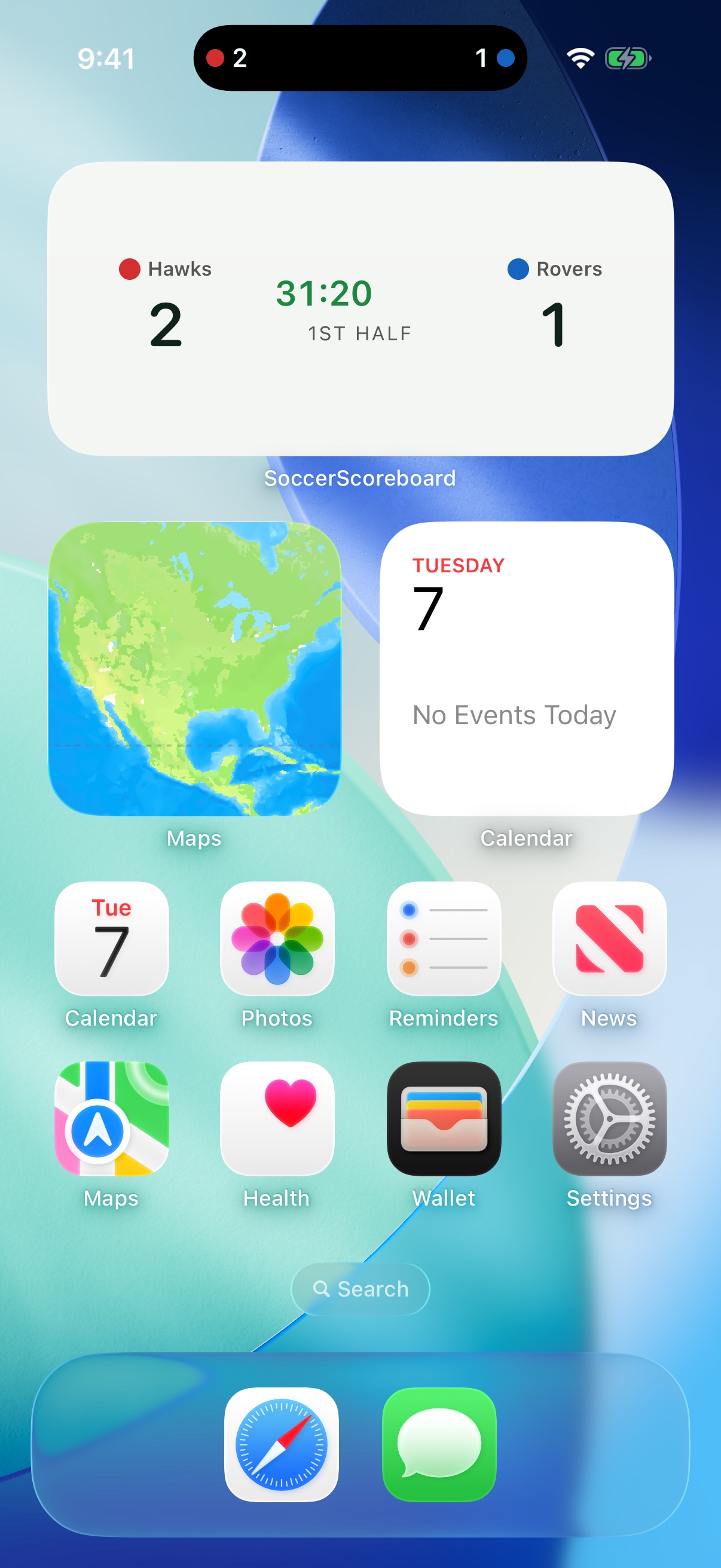 iPhone Home Screen with the Soccer Scoreboard widget showing Hawks 2, Rovers 1